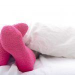 wat te doen tegen koude voeten in bed?